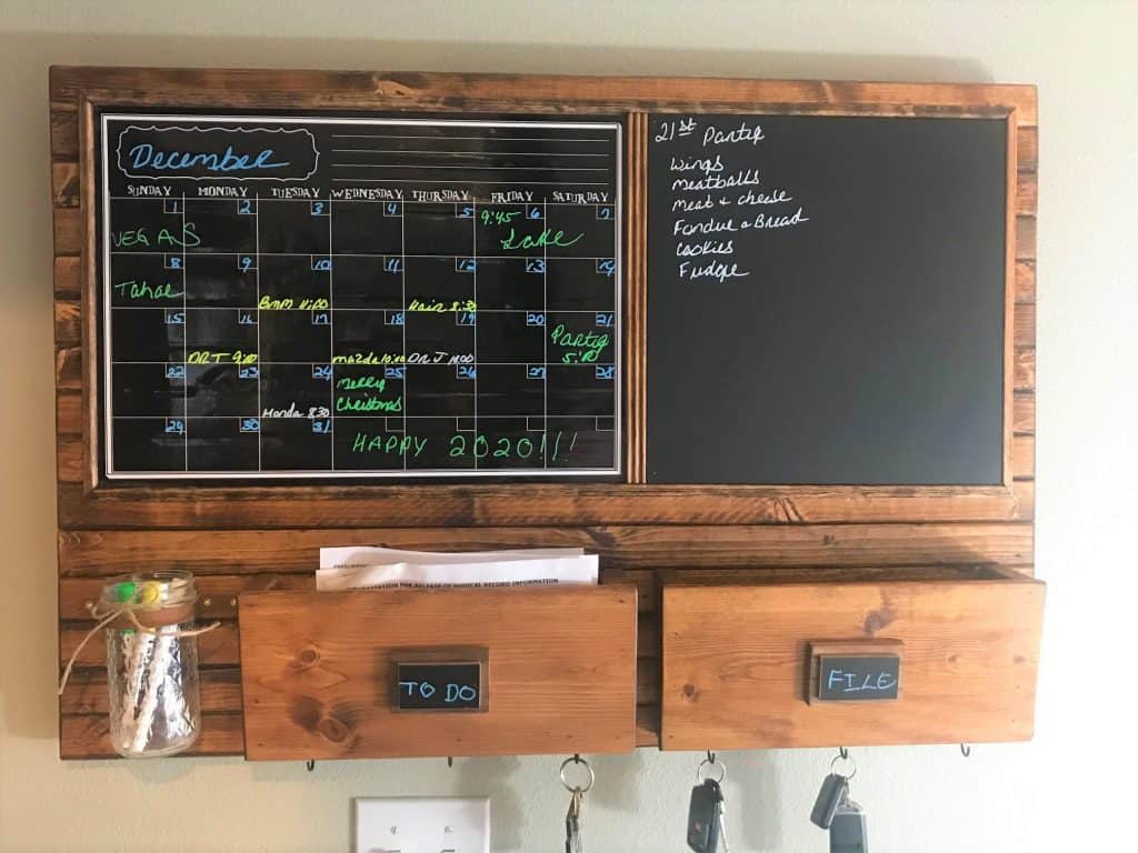 Harmony Boards command center with chalkboard, calendar, two mailboxes, and key hooks