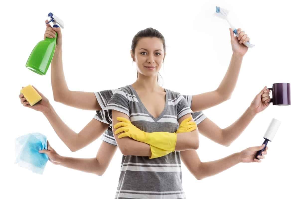 Woman with 8 arms holding showing off her cleaning tips