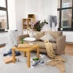 Messy living room to show how to declutter when you don't know where to start