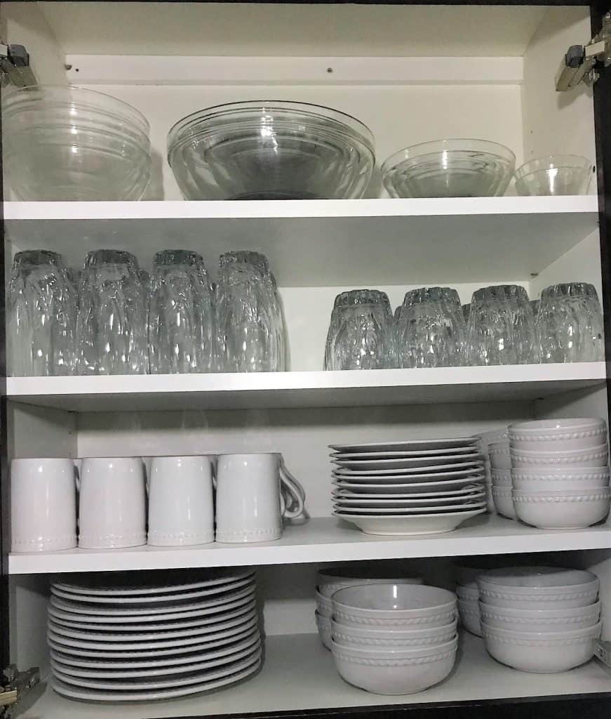 Dishes organized in cabinet