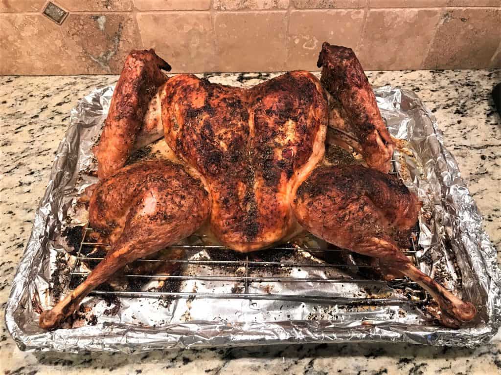 a quick and easy spactchcocked turkey on a cooling rack