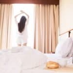 Woman stretching as par of her morning routine