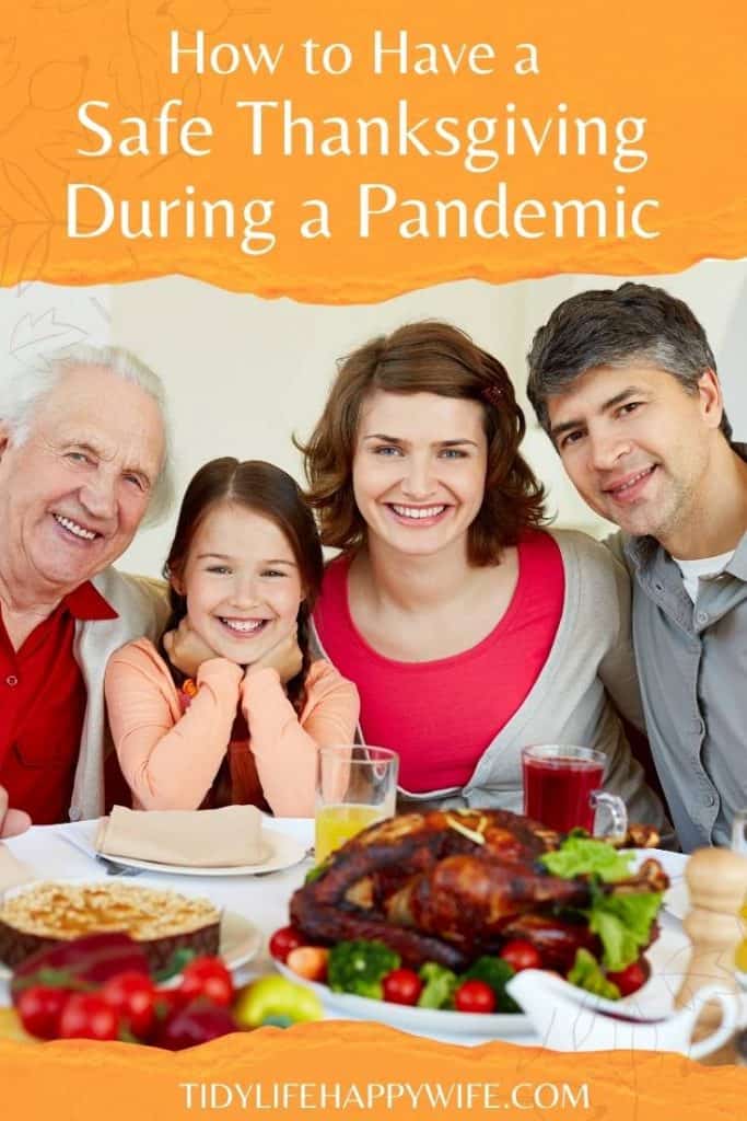 family celebrating a safe Thanksgiving dinner during a pandemic