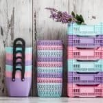 3 stacks of pastel colored organizing baskets