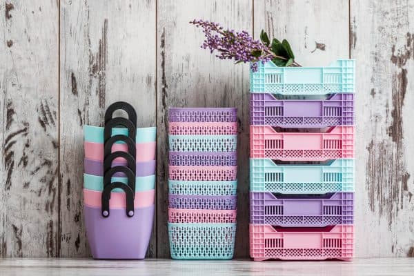 3 stacks of pastel colored organizing baskets
