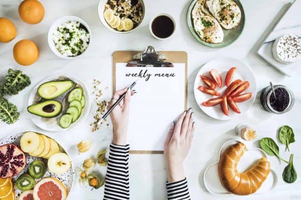 Woman planning meals for the week