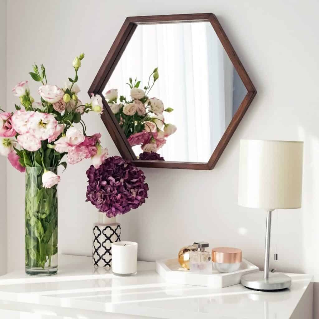 tidy dresser top with trinket dish to hold loose items